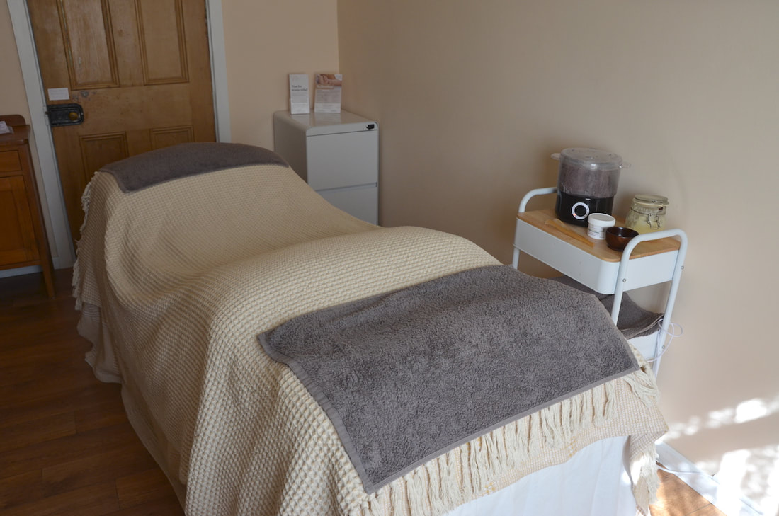 Adjustable massage table for reflexology